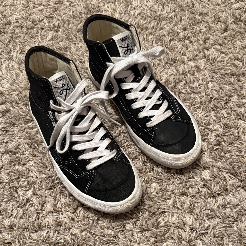 Vans Lizzie Black and White High-Top Sneakers